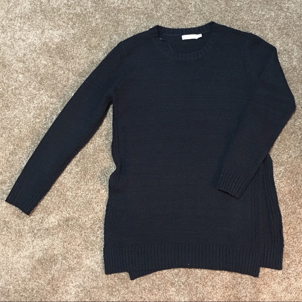 Lush navy blue sweater with side slit detail